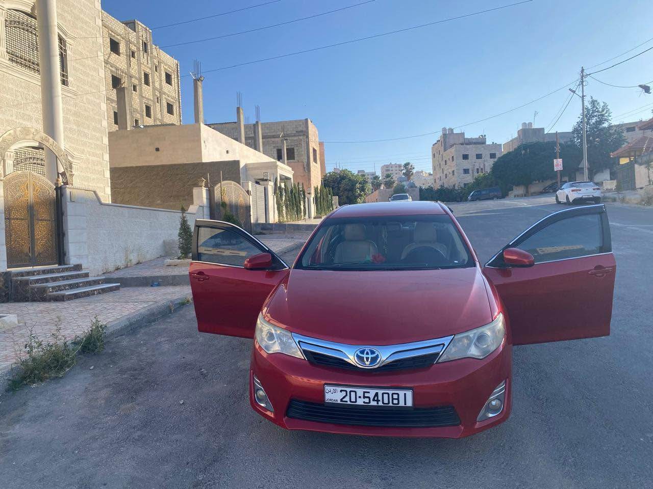 سيارةToyota كامري 2012 بحالة ممتازة في القويسمة مع كفالة وبطارية هايبرد